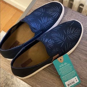NWT  Olukai black slip on sneakers